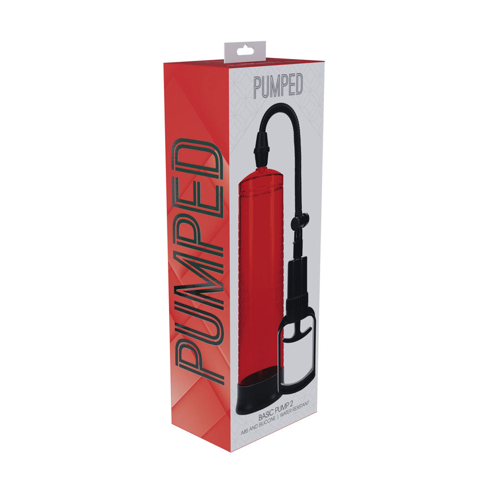 The PUMPED Basic Pump 2 - Red features a red package with a black and red vacuum erection device. The box displays the product image with a geometric background, offering an elegant solution for erectile dysfunction treatment.