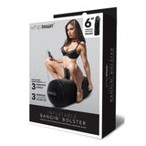 The Whipsmart Inflatable Bangin Bolsters packaging features a woman in lingerie using the cushion with its 6-inch vibrating dong. It boasts an inflatable design, detachable remote with three vibration levels, and three handles for secure play.