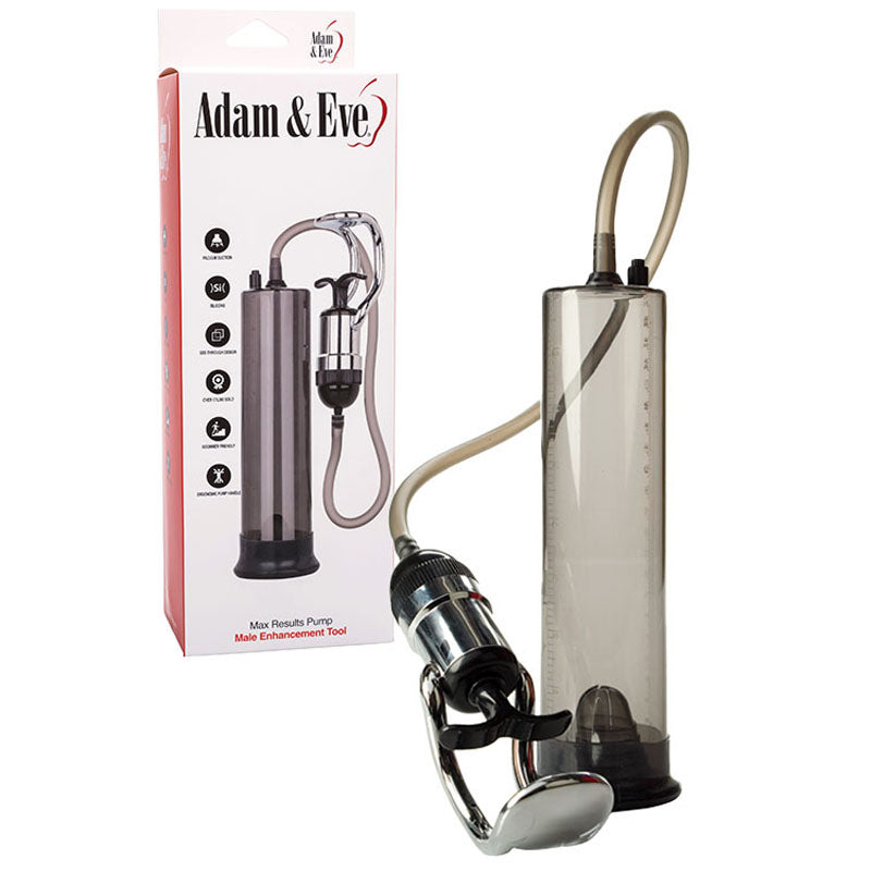 Image of a clear vacuum pump with a hose and hand pump. Beside it, the Adam & Eve MAX RESULTS Pump - Clear Penis Pump packaging, labeled as a male enhancement tool, showcases superior suction features on a sleek white and red box with icons and product details.