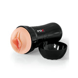 Black cylinder-shaped adult toy with realistic silicone texture and EZ Grip design. The removable cap features PDX on the side. Resembling human anatomy, it is called PDX Extreme Wet Pussies - Super Luscious - Flesh Vagina Stroker against a plain white background.