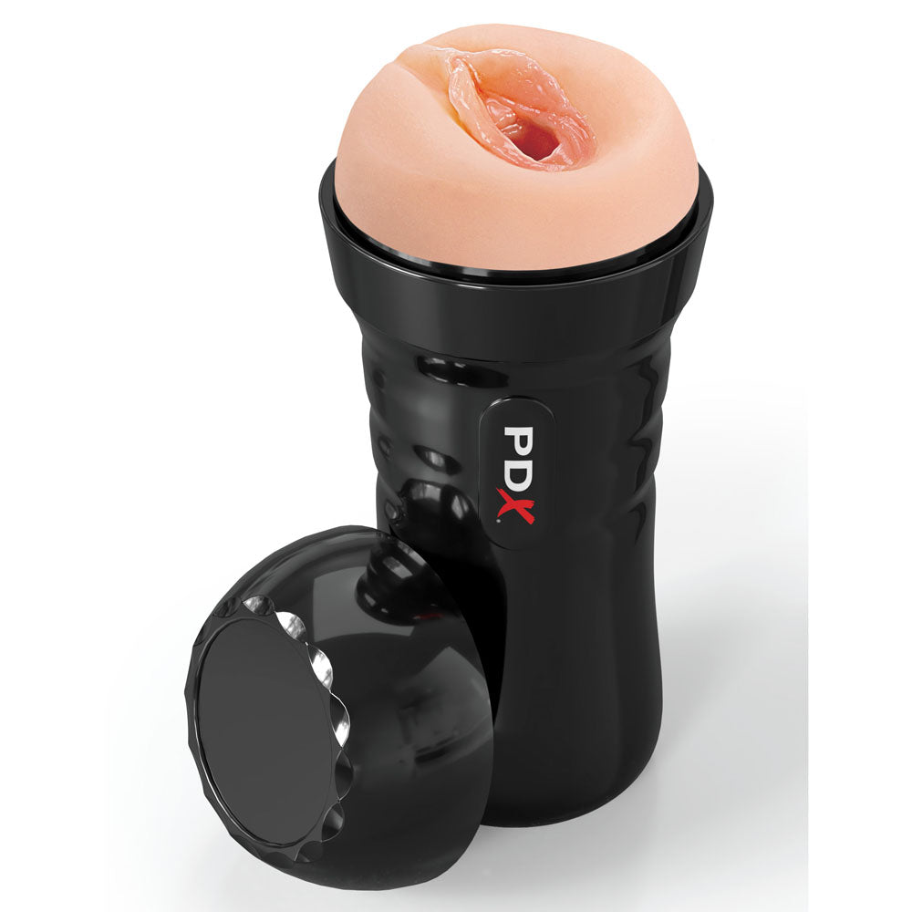 The PDX Extreme Wet Pussies - Super Juicy Snatch features a black cylindrical design with a beige, flesh-like opening and includes a removable cap to reveal the textured pleasure tunnel. The brand logo PDX is printed in white and red on the side.