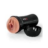 The PDX Extreme Wet Pussies - Super Juicy Snatch is a black cylindrical adult toy with an EZ Grip design, featuring a soft brown insert. With its lid off, the realistic pleasure tunnel is exposed. PDX in red and white adorns the sleek surface.