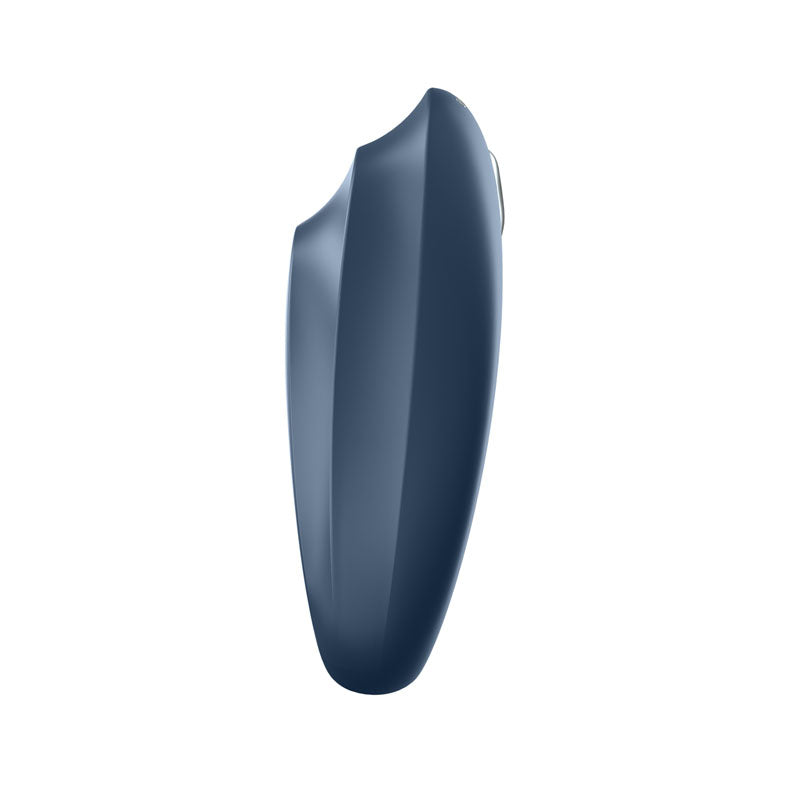 The Satisfyer Strong One is a sleek, dark blue vibrating cock ring made from body-friendly silicone. It features a curved, ergonomic design with subtle ridges and a glossy finish. Compatible with the Satisfyer App, it offers uniform color and discreet appearance for an elegant touch.