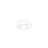 A small, clear glass bead with a donut-like shape sits on a plain white background. Crafted from thermo plastic rubber, its smooth surface allows light to refract, creating subtle reflections similar to the Sport Fucker Rubber Cockring - Clear Cock Ring.