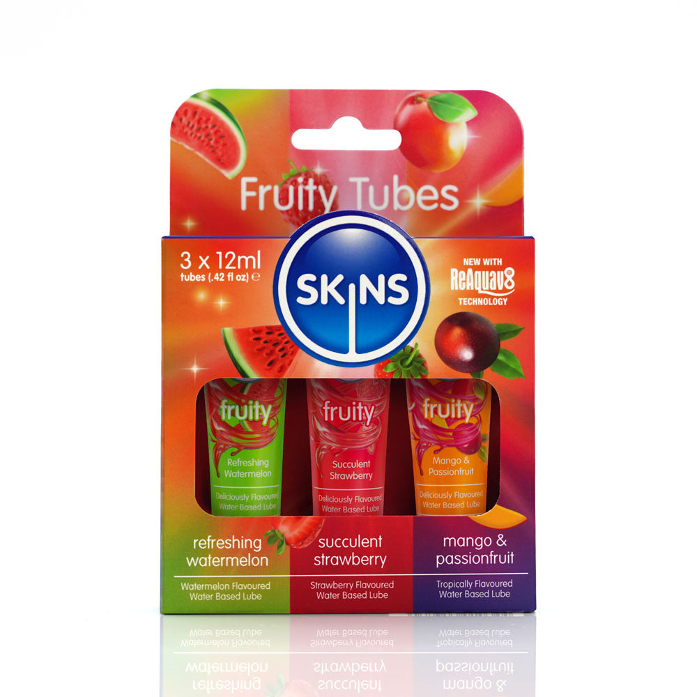 The Skins Fruity Tubes feature colorful packaging with three 12ml vegan, water-based lubes: Watermelon, Strawberry, & Mango & Passionfruit. Each tube is adorned with vibrant fruit images and showcases New with Reaquav8 Technology in the upper right corner.