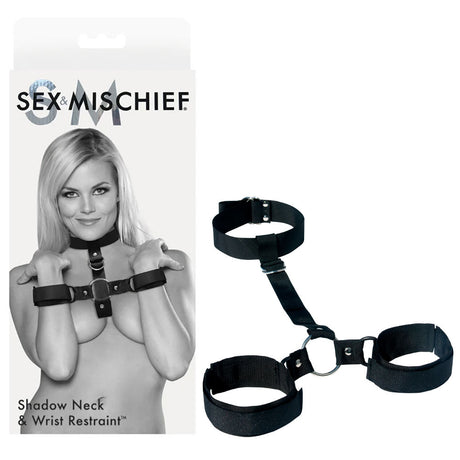 The image displays the Sex & Mischief Shadow Neck and Wrist Restraint featuring a model showcasing adjustable bondage restraints ideal for BDSM beginners. The sleek black design includes a collar and wrist straps linked by a short strap, all part of the renowned Sex & Mischief brand.