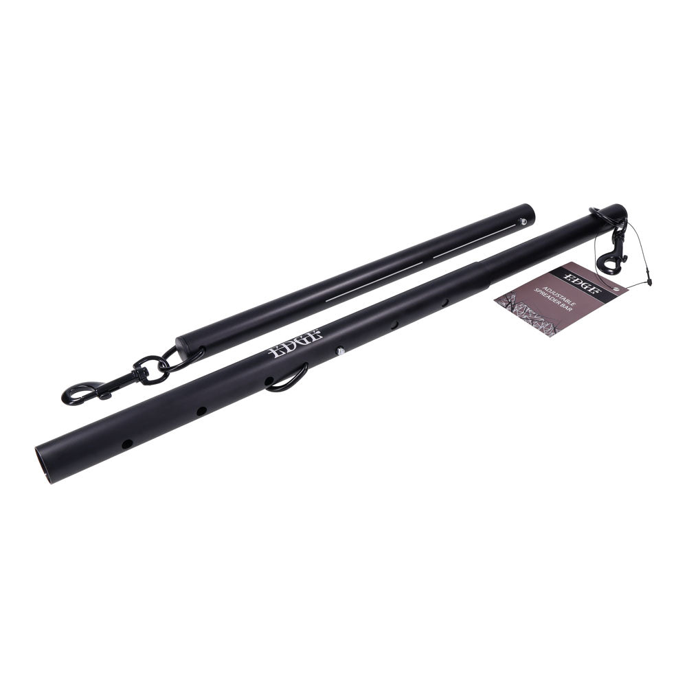 The EDGE Adjustable Spreader Bar consists of two thin, cylindrical black metal rods with hooks and loops on the sides for attachment. One rod is longer and features a rectangular branded tag with images and text, indicating they are used for hanging or support purposes.