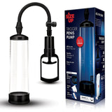 The image displays the Size Up Trigger Penis Pump - Clear Penis Pump, featuring a transparent cylinder with measurement markings, a black trigger grip handle, and a flexible hose. The packaging emphasizes its brand name, suction capabilities, enlargement claims, and pressure release features.