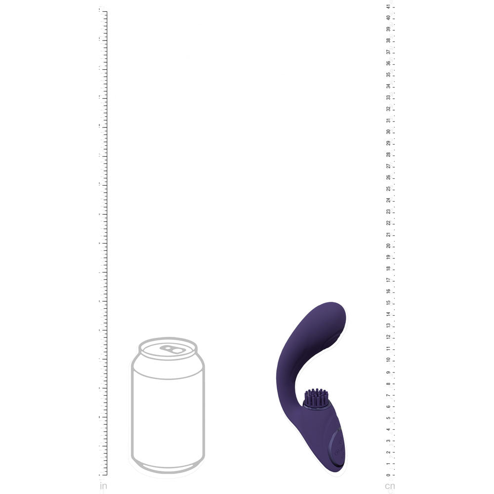 The VIVE Gen - Purple is a curved object made from medical-grade silicone, similar in size to a soda can. It has a textured surface and rulers on each side—left for inches, right for centimeters—centrally aligned with the can against a white backdrop.