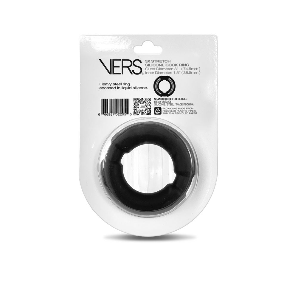 The image shows the VERS Liquid Silicone Weighted Steel Core C-Ring, a black cock ring designed for enhanced sexual performance. It has a 1.75 inner diameter and 2.2 outer diameter, with sleek white packaging featuring black text, a barcode, and a QR code for more details.