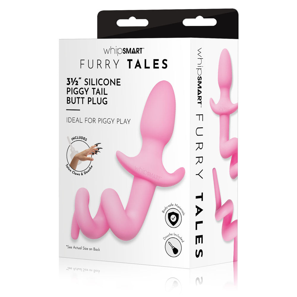 The image displays the WhipSmart Furry Tales 3.5 Silicone Piggy Tail Butt Plug box, highlighting its body-safe material and piggy play use. The white packaging with pink accents features a spiral-shaped plug.