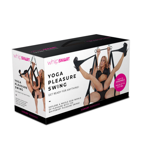 WhipSmart Yoga Sex Swing - Black Swing packaging designed for adventurous couples, shows adjustable straps in action with text stating Luxury Bondage, Easy to Assemble, and Supports up to 300 lbs. The background is mostly white with black and purple accents.