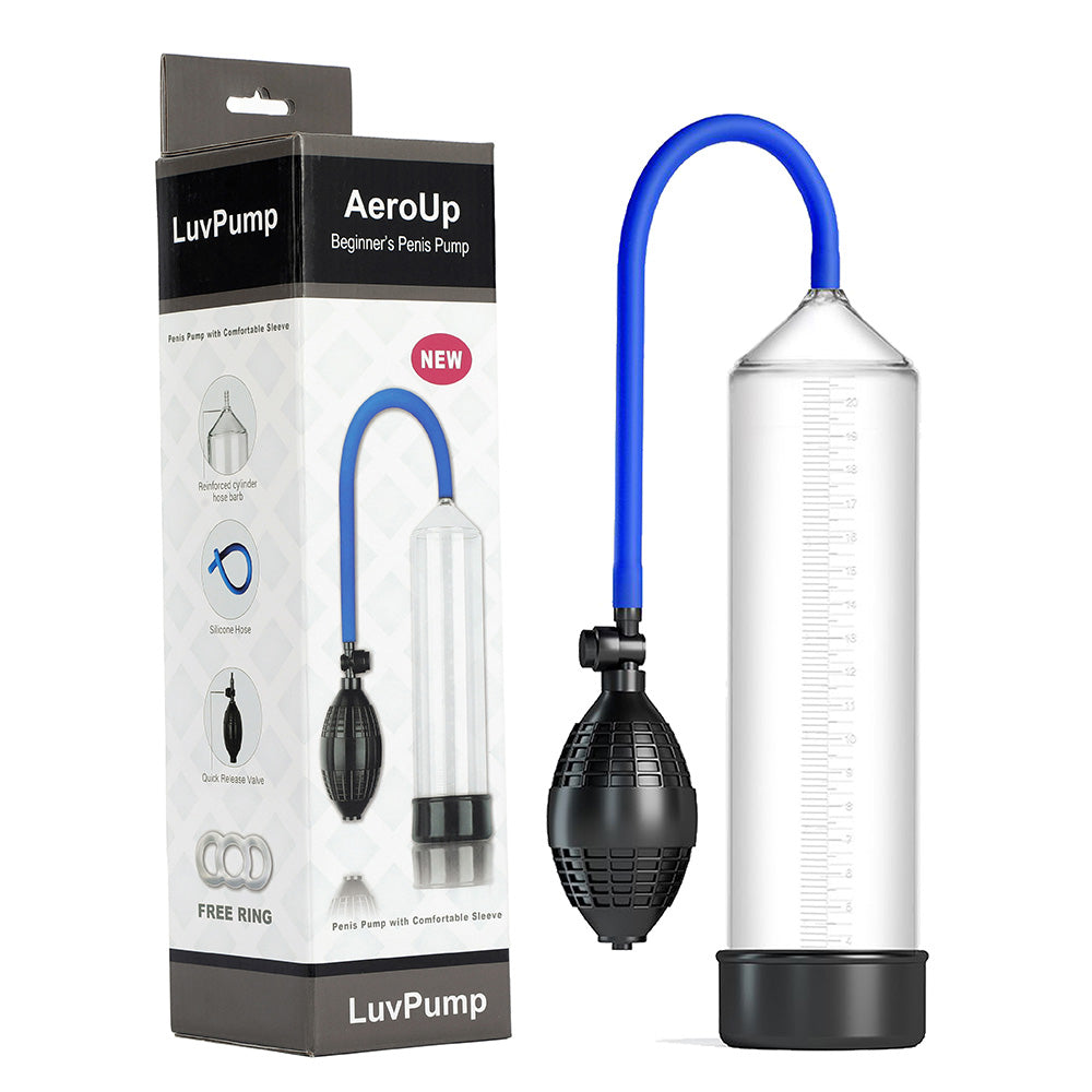 The LuvPump AeroUp Beginners Penis Pump - Clear Penis Pump box features a blue tube, black pump bulb, and transparent cylinder with measurements. Descriptions like Beginners Penis Pump, Comfortable Sleeve, and Free Ring are included, alongside the displayed male enhancement tool.