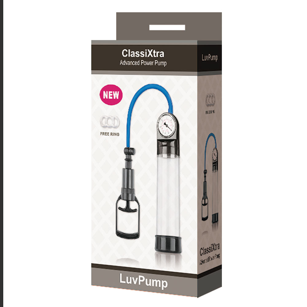 The image shows the packaging for the LuvPump ClassiXtra Advanced Power Pump, featuring a clear cylinder penis pump with a blue hose and pressure gauge. A NEW Free Ring label highlights its erection-enhancing focus, set against a subtle diamond-patterned background.