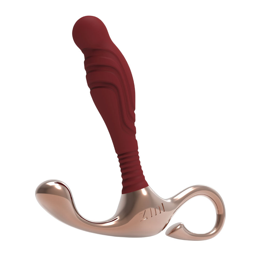 The Zini Janus Lamp Iron - Small is a red and gold, curved ergonomic prostate massager with a textured handle for easy grip and a smooth metallic base. It showcases a polished finish and is crafted from body-safe materials for peace of mind.