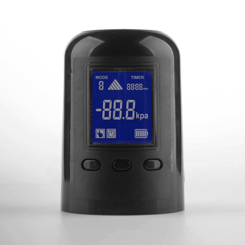 The LuvPump Smart Penis Pump features a black digital display with a rectangular LCD screen, showing 00.0 kPa and icons for mode, timer, and battery. Below are three round buttons. This clear, USB rechargeable device is set against a plain white background.