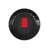 The Zero Tolerance POP ON THE GO Dark - Brown Vagina Masturbator lid features a matte black surface with pleasure ribs for grip and a central red pull-tab for easy manual opening. Photographed from above on a white background, the lid highlights its user-friendly design.