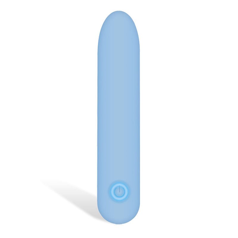 The Adam & Eve Eves Silky Sensations Rechargeable Bullet, a blue 9.4 cm USB rechargeable bullet, features a smooth silicone surface with an elongated cylindrical design, slightly tapered top, and power button near the base. It casts a soft shadow to the left due to lighting from the right.