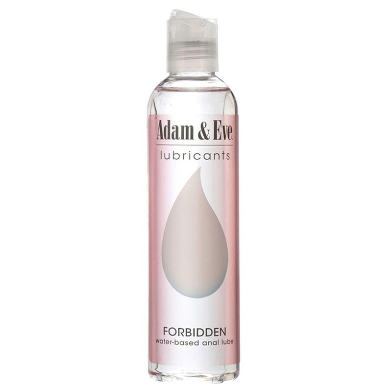 A clear bottle with a pink label displays a large water droplet and Adam & Eve Forbidden - Water Based Anal Lubricant. Ideal for sensual encounters, its latex compatible and features a flip-top cap for easy dispensing.