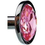 The Adam & Eve Pink Gem Anal Plug - Medium, features a shiny pink gem set in a 8.2 cm silver plug that reflects sparkling shades of pink. Its polished, smooth metallic finish resembles aluminum and the white background highlights its elegance, inspiring thoughts of unique temperature play accessories.