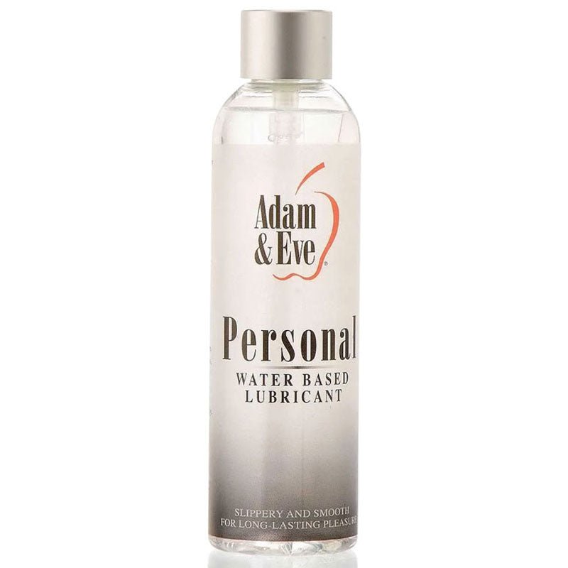 The Adam & Eve Personal Water Based Lubricant comes in a clear 237 ml (8 oz) bottle with a red apple design. It promises silky smooth and slippery for long-lasting pleasure, is latex-compatible, features a silver cap, and contains a clear liquid inside.