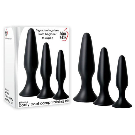 The Adam & Eve Silicone Booty Boot Camp Training Kit features three black butt plugs for anal exploration, offering varying sizes from beginner to expert. The packaging displays the enticing product image.