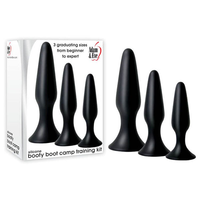 The Adam & Eve Silicone Booty Boot Camp Training Kit features three black butt plugs for anal exploration, offering varying sizes from beginner to expert. The packaging displays the enticing product image.