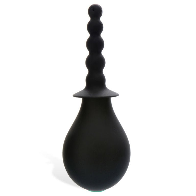 The Adam & Eve Smooth & Easy Silicone Douche in black features a silicone tip, bulbous reservoir, and a graduated, ribbed nozzle with rounded sections for depth control and comfortable insertion. Its smooth, teardrop-shaped base ensures easy cleaning for a comfortable douching experience.