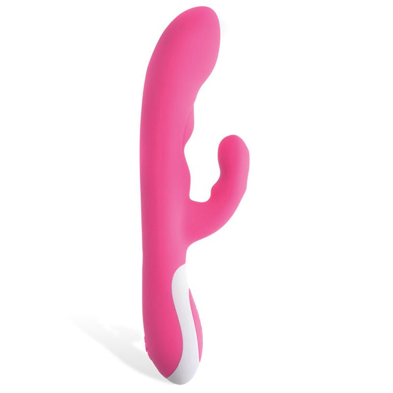 The Adam & Eve The Warming Rabbit G vibrator, in pink silicone with a white accent, features a curved G-Spot tip and dual stimulation through its ergonomic external stimulator. It has a smooth finish and stands upright against a white background.