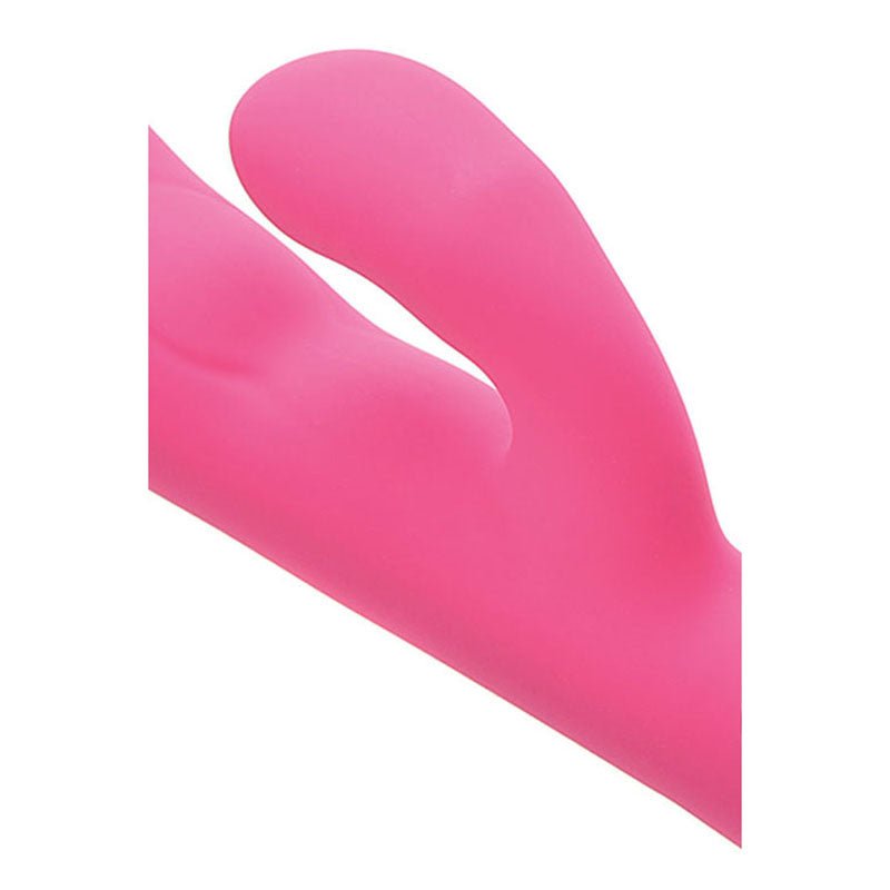 Close-up of the Adam & Eve The Warming Rabbit G in pink, a silicone vibrator with dual curved sections for optimal stimulation. The larger main shaft targets the G-Spot, complemented by a smaller pleasure enhancer. Its smooth texture and vibrant color offer a modern, sleek look.