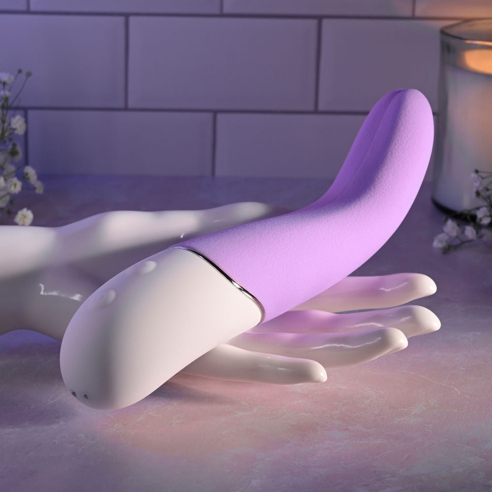 Buy Evolved SLIP OF THE TONGUE - Purple 21.1 cm USB Rechargeable Flicking Tongue Vibrator at NZ’s Mega Adult Toys Store. Discover premium sex toys with discreet shipping at the best price in NZ