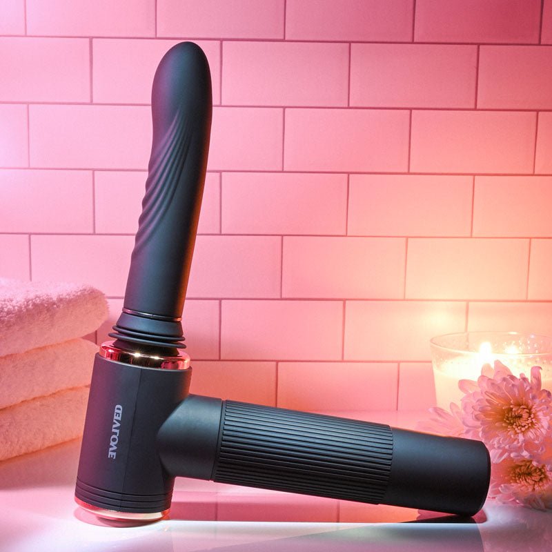 Buy Evolved TOO HOT TO HANDLE - Black USB Rechargeable Thrusting Vibe with Stand at NZ’s Mega Adult Toys Store. Discover premium sex toys with discreet shipping at the best price in NZ