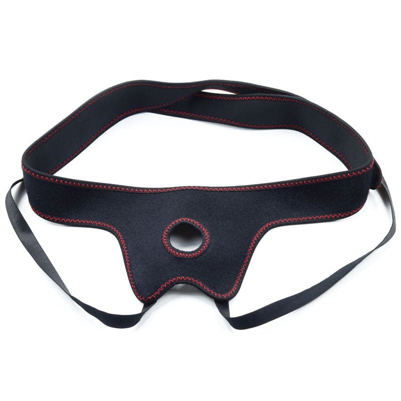 The Ingen Easy Strap-On Harness features a black adjustable design with red stitching and a central circular opening for secure attachment. Made from flexible material, it includes stretchable webbing and ribbons for fastening, perfect for stability in fitness or sports activities.