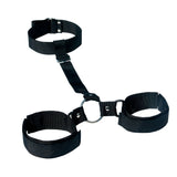 The Sex & Mischief Shadow Neck and Wrist Restraint features three connected nylon cuffs—two parallel, one perpendicular—with metal rings and adjustable buckles, designed for bondage beginners. The soft yet sturdy material ensures a comfortable experience.